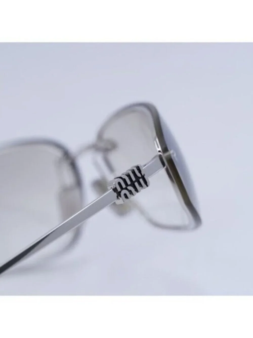 Miu Miu MUA50S 1BC8H1 Sunglasses Silver Rectangle Frame